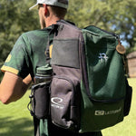 Player wearing the Latitude 64 Core Pro E3 Isaac Robinson signature backpack on the course